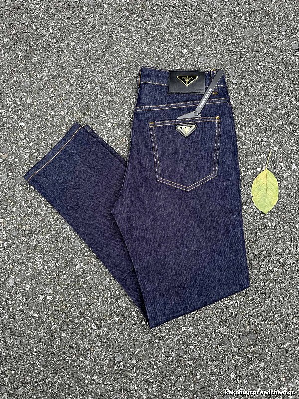 Prada Dark Indigo Logo Jeans with triangle badge hardware and contrast pocket stitching